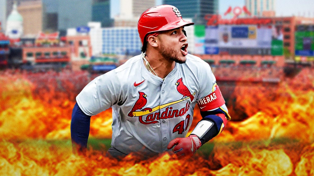 St. Louis Cardinals star Willson Contreras in front of Busch Stadium with fire around him.