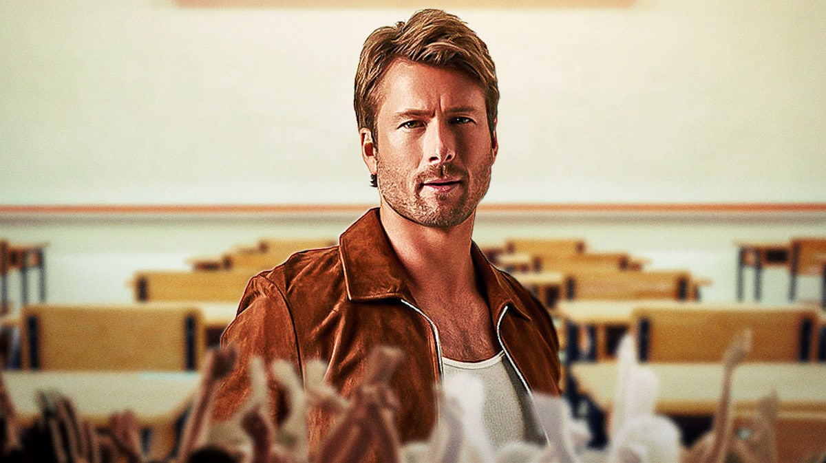 Glen Powell in a school classroom.