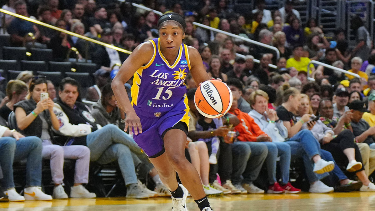 LA Sparks guard Aari McDonald (15) dribbles the ball against the Washington Mystics in the first half at Crypto.com Arena.