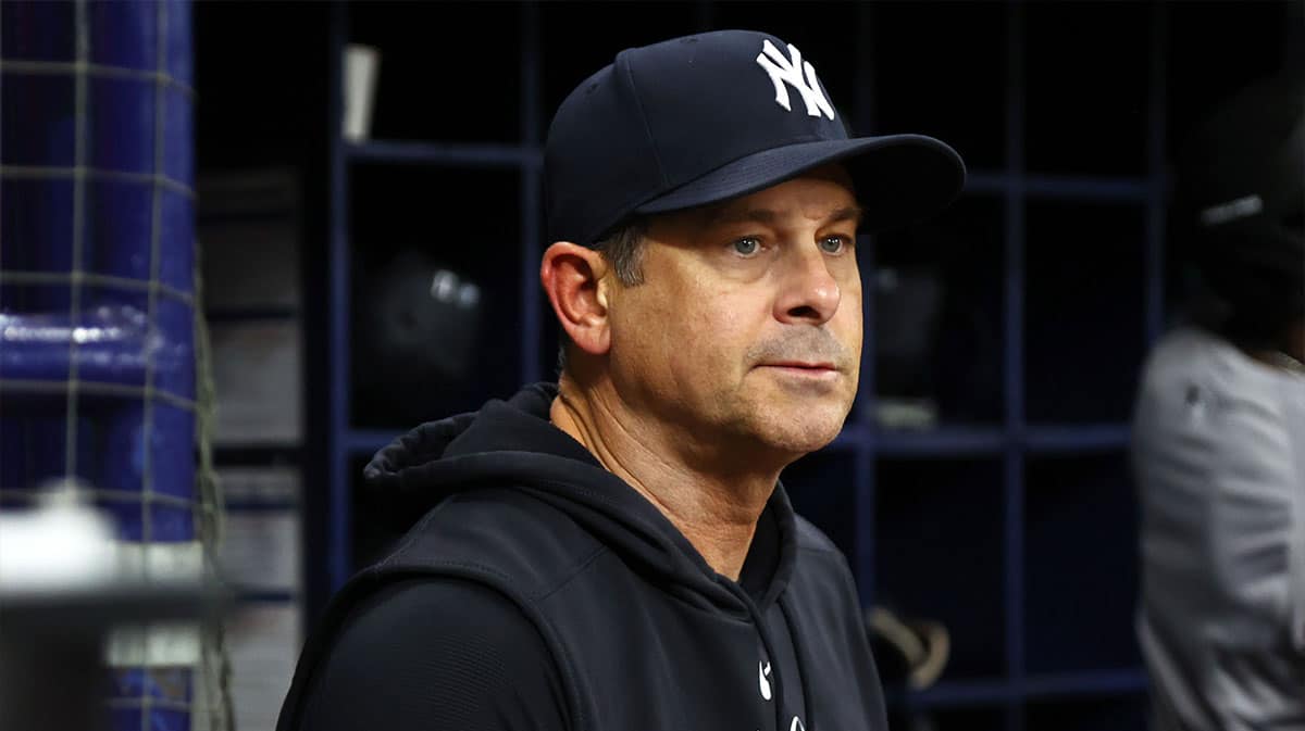 New York Yankees manager Aaron Boone (17) looks on against the Tampa Bay Rays during the seventh inning at Tropicana Field.