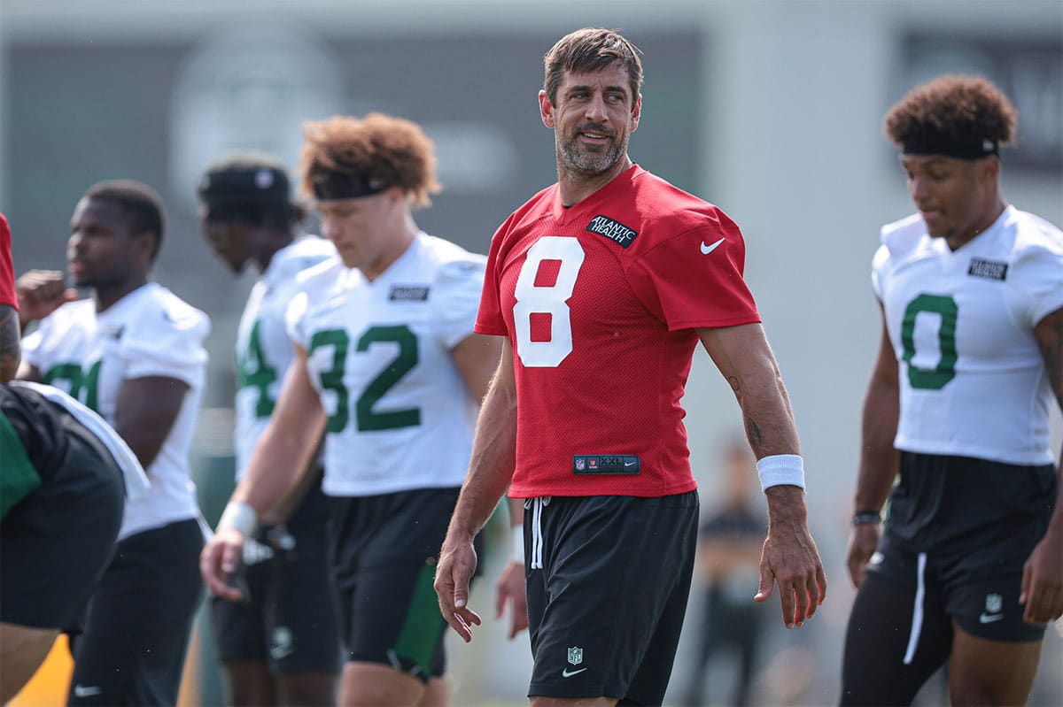 New York Jets quarterback Aaron Rodgers (8) looks back during training camp at Atlantic Health Jets Training Center.