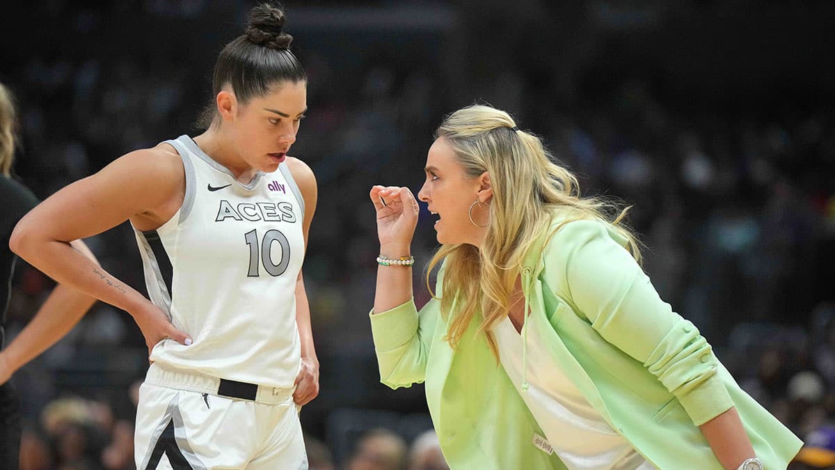 Las Vegas Aces coach Becky Hammon (right) talks with guard Kelsey Plum (10) in the second half against the LA Sparks.