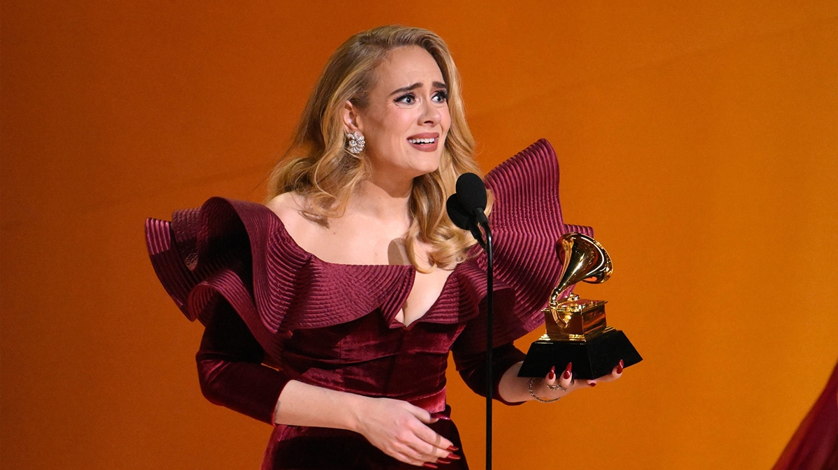 Adele accepting an award at the 2023 Grammys.