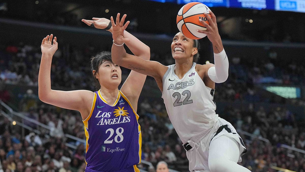 Las Vegas Aces center A'ja Wilson (22) shoots the ball against LA Sparks center Li Yueru (28) in the second half at Crypto.com Arena.