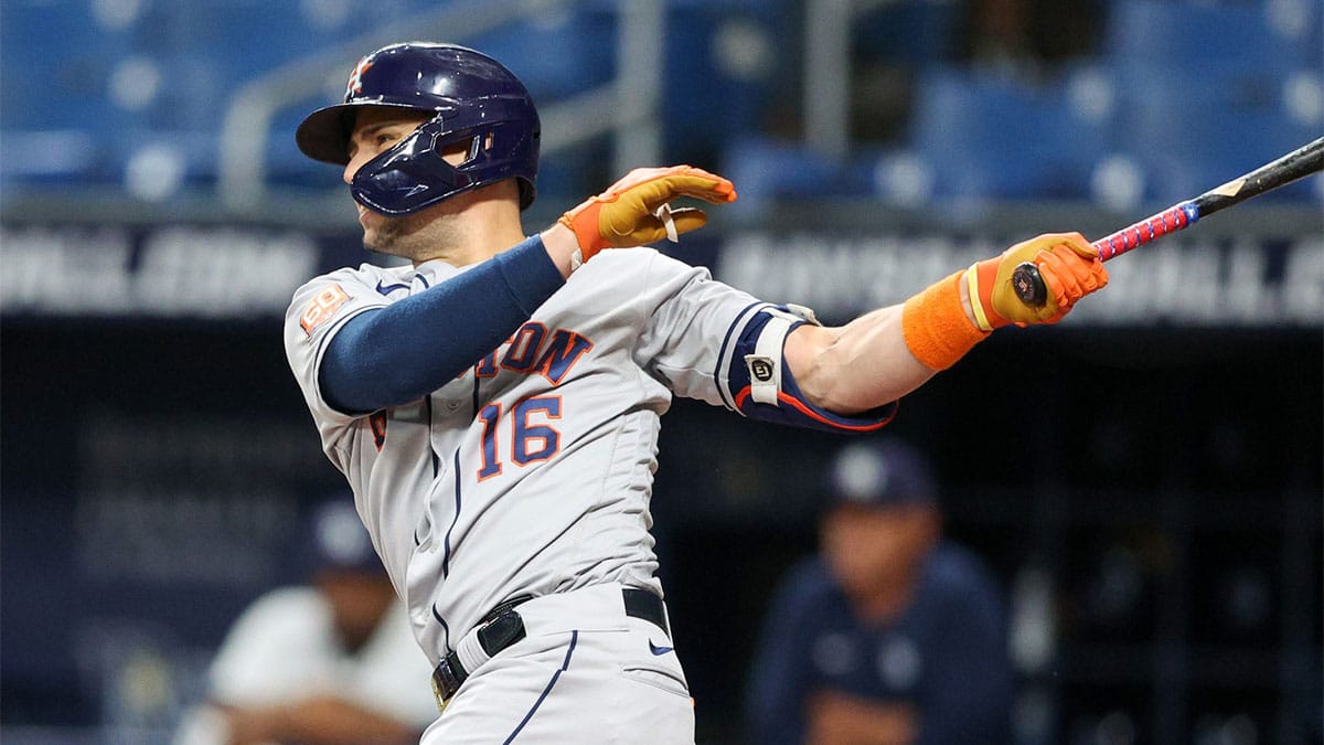 Houston Astros third baseman Aledmys Diaz (16) hits an rbi single against the Tampa Bay Rays in the first inning at Tropicana Field.