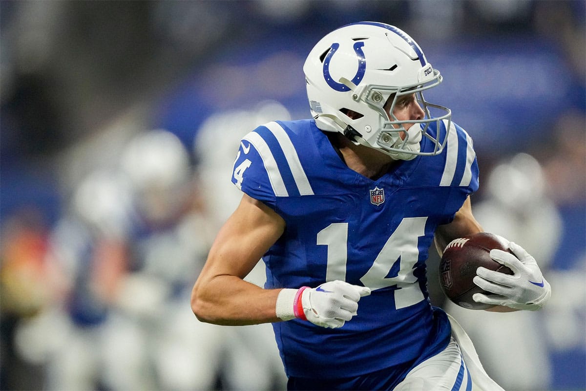 Indianapolis Colts wide receiver Alec Pierce (14) looks back as he runs to the end zone for a touchdown Sunday, Dec. 31, 2023, during a game against the Las Vegas Raiders at Lucas Oil Stadium in Indianapolis.