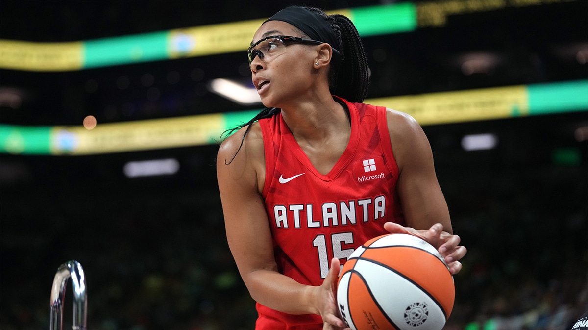 Atlanta Dream guard Allisha Gray gathers a ball during the WNBA All-Star Game 3-point contest at Footprint Center in Phoenix on Friday, July 19, 2024.