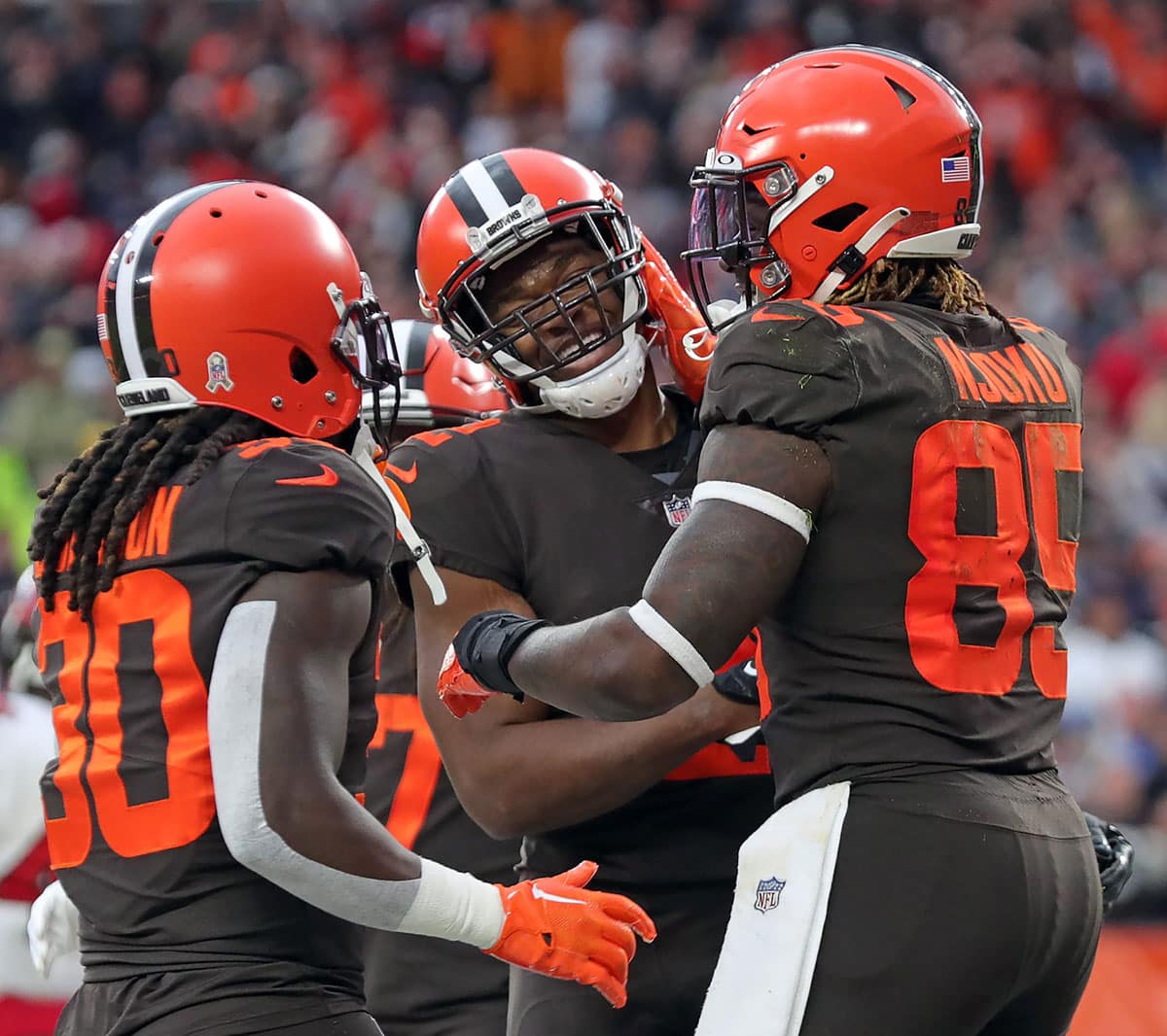 Browns wide receiver Amari Cooper (middle) celebrates with David Njoku (85) after a second-half touchdown against the Buccaneers, Sunday, Nov. 27, 2022, in Cleveland