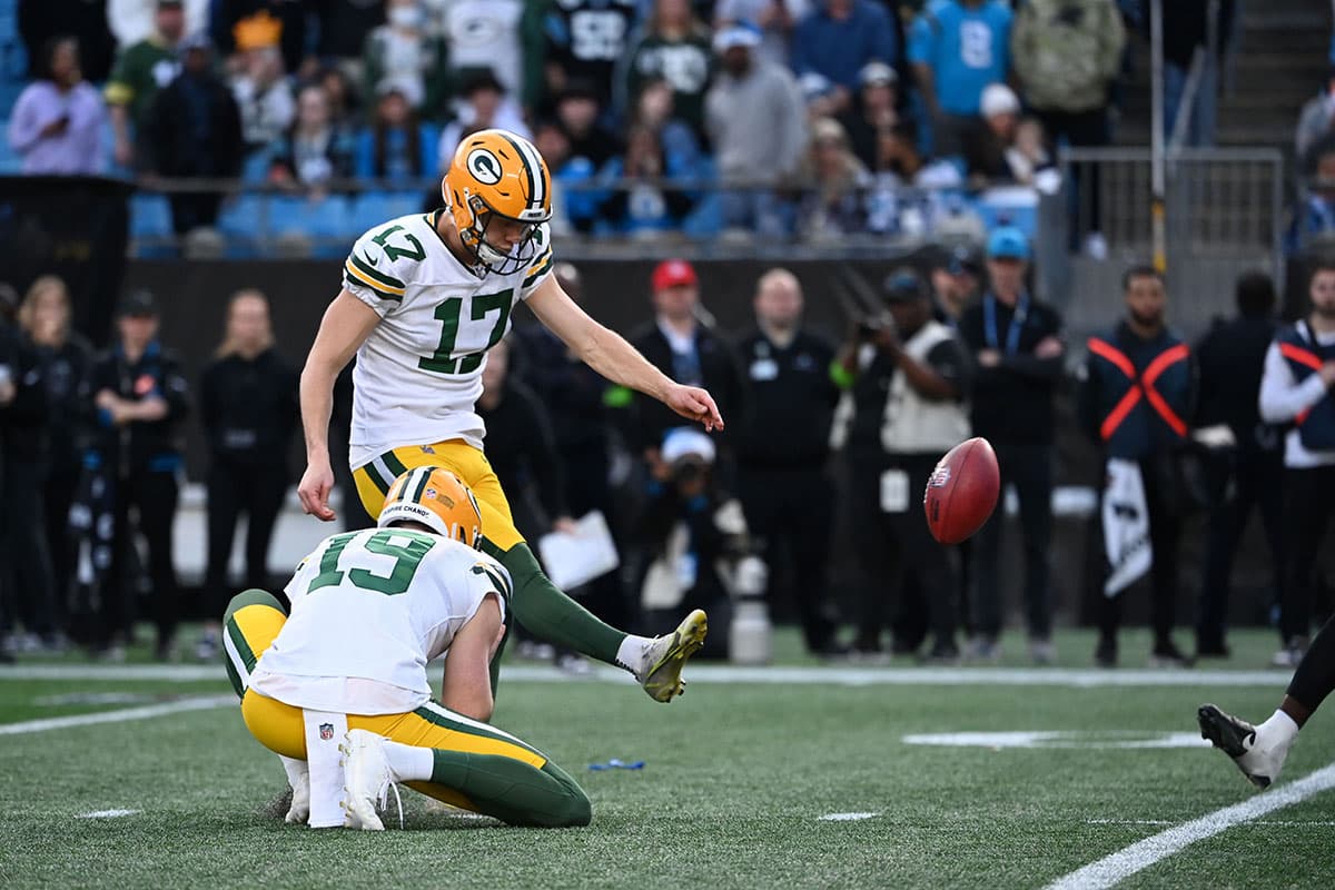 Green Bay Packers place kicker Anders Carlson (17)kicks the game winning field goal in the fourth quarter at Bank of America Stadium.