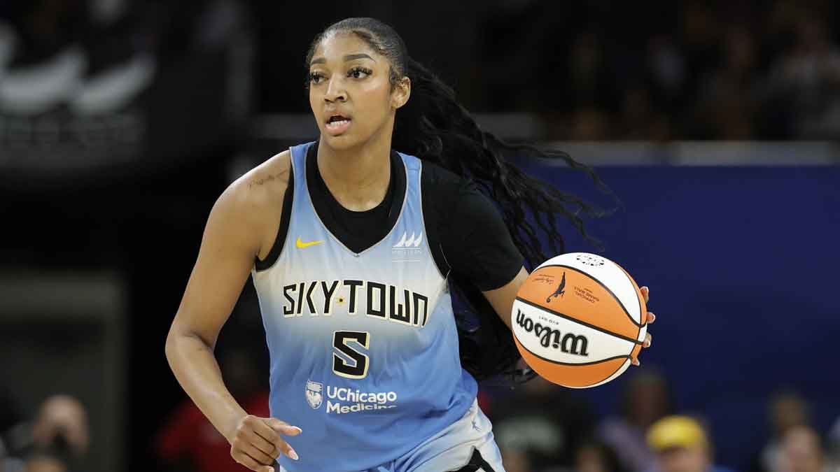 Chicago Sky forward Angel Reese (5) brings the ball up court against the New York Liberty during the second half of a WNBA game at Wintrust Arena.