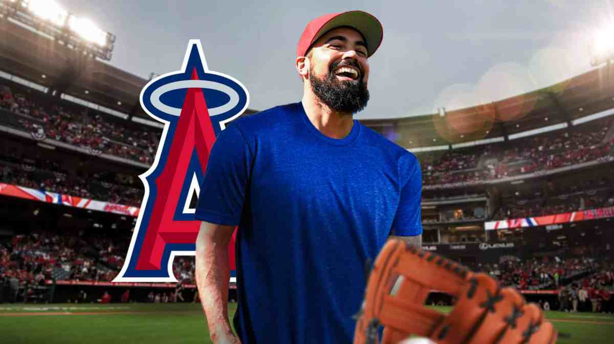 Anthony Rendon in street clothes with the Los Angeles Angels field behind him and an Angels logo next to him as Rendon is once again on the injured list where he has spent most of his time since joining the Angels.