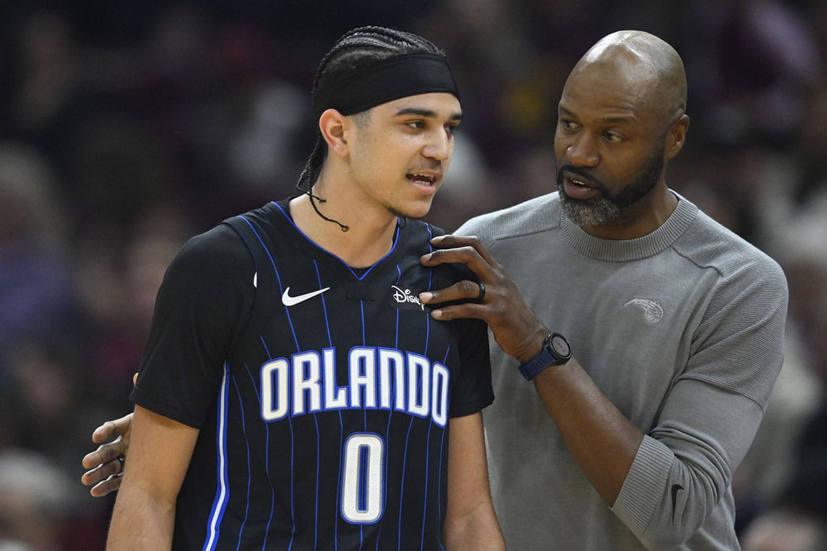 Orlando Magic head coach Jamahl Mosley talks with guard Anthony Black (0) in the second quarter against the Cleveland Cavaliers at Rocket Mortgage FieldHouse.