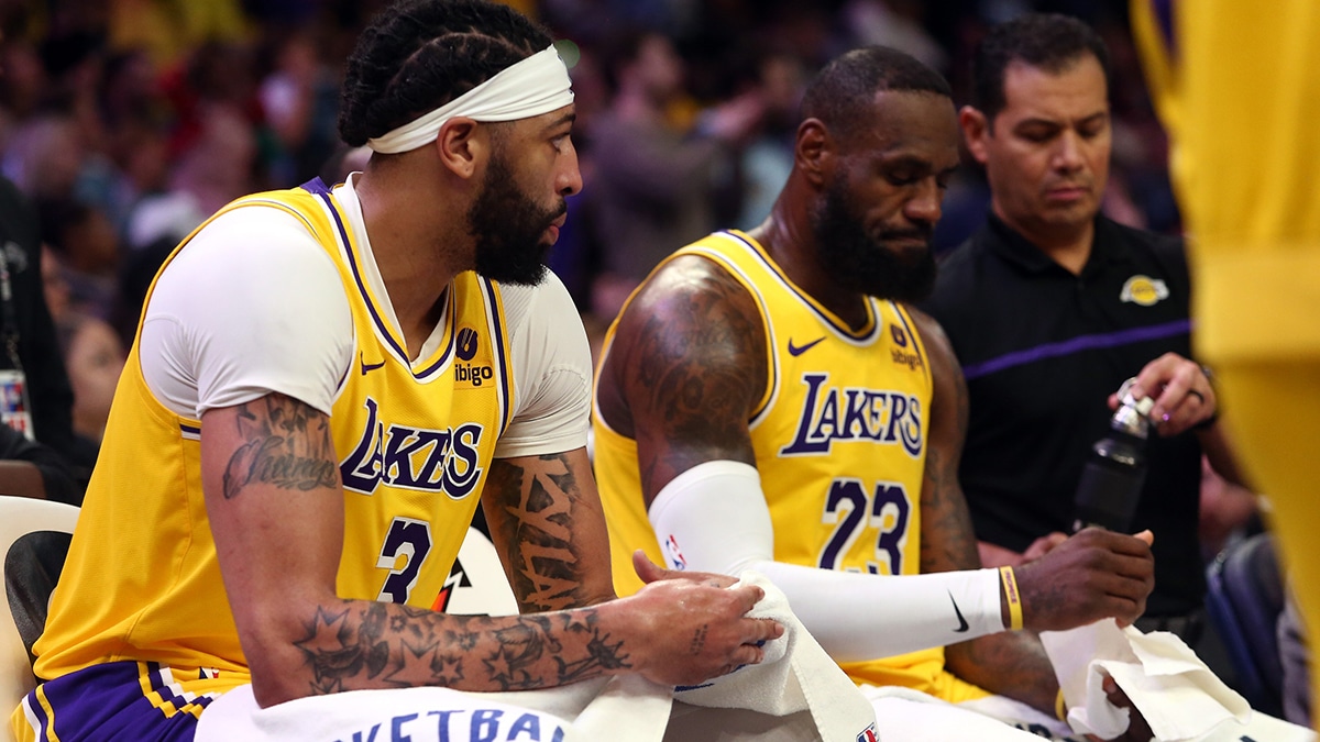 Los Angeles Lakers forward Anthony Davis (3) and forward LeBron James (23) sit on the bench during a time out during the second half against the Memphis Grizzlies at FedExForum.