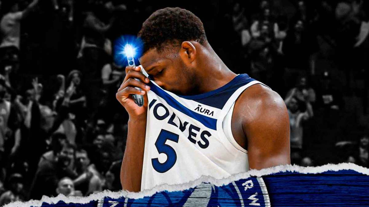 Timberwolves' Anthony Edwards sad, while holding a neuralyzer from Men In Black