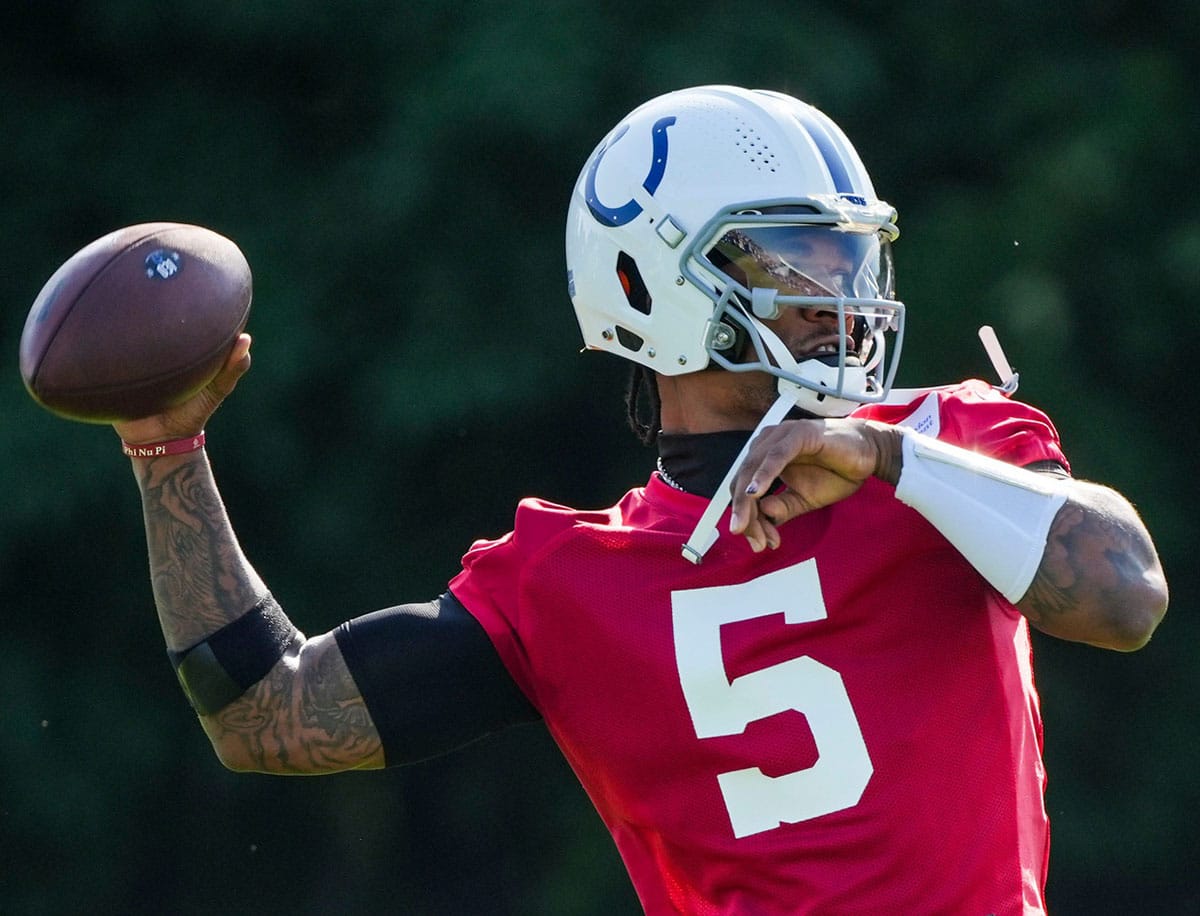Indianapolis Colts quarterback Anthony Richardson (5) throws a pass while warming up Saturday, July 27, 2024, during the Indianapolis Colts’ training camp at Grand Park Sports Complex in Westfield.