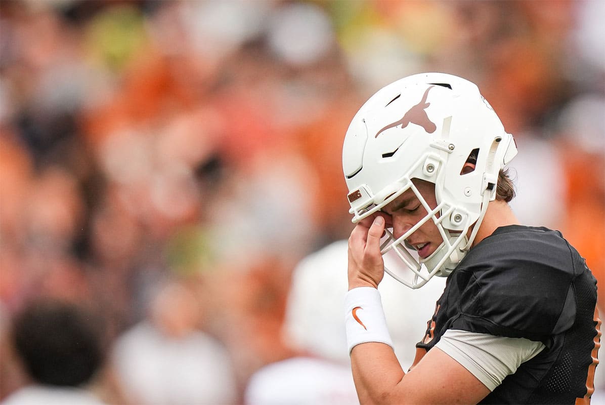 exas Longhorns quarterback Arch Manning (16) warms up ahead of the Longhorns' spring Orange and White game at Darrell K Royal Texas Memorial Stadium.