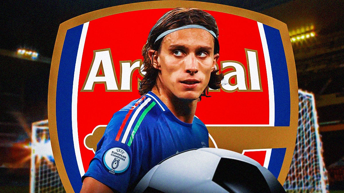 Riccardo Calafiori in front of the Arsenal logo