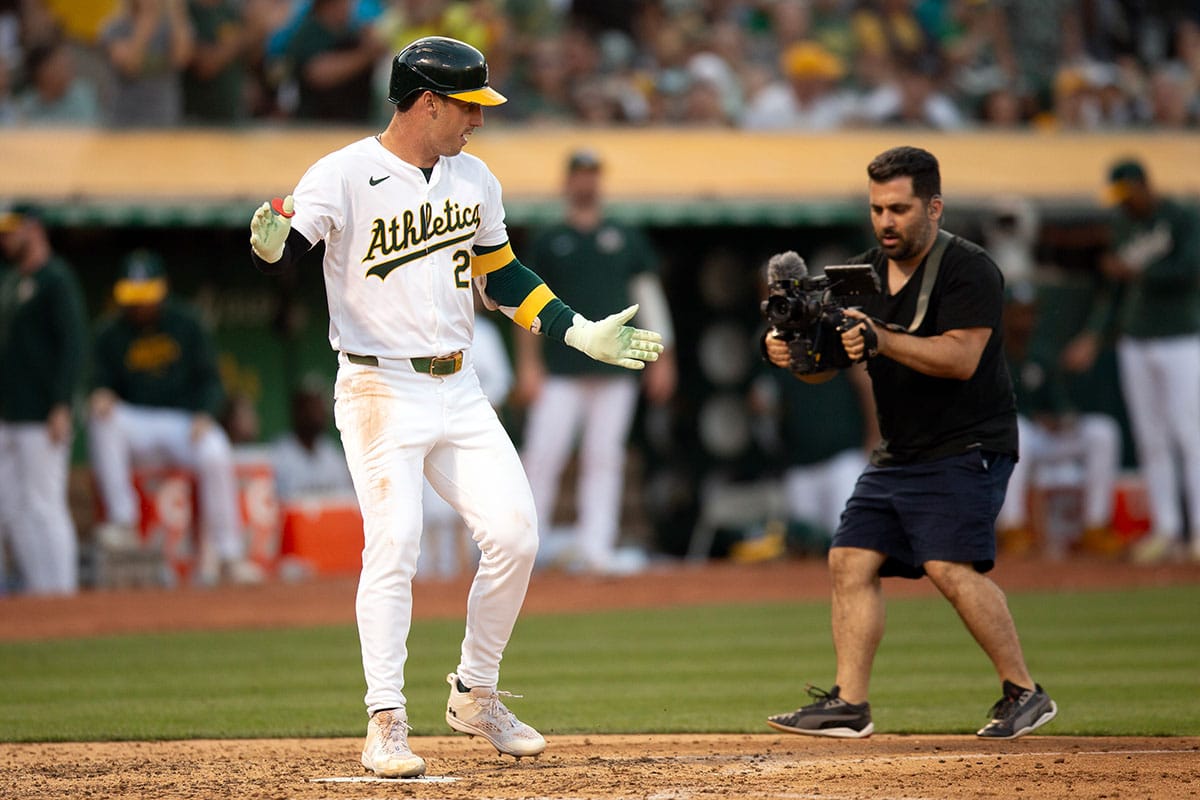Oakland Athletics designated hitter Brent Rooker (25) celebrates his solo home run against the Los Angeles Angels during the sixth inning at Oakland-Alameda County Coliseum.