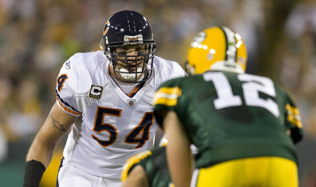 Chicago Bears linebacker Brian Urlacher (54) lines up for a play during the first quarter against the Green Bay Packers at Lambeau Field. The Packers defeated the Bears 21-15. 