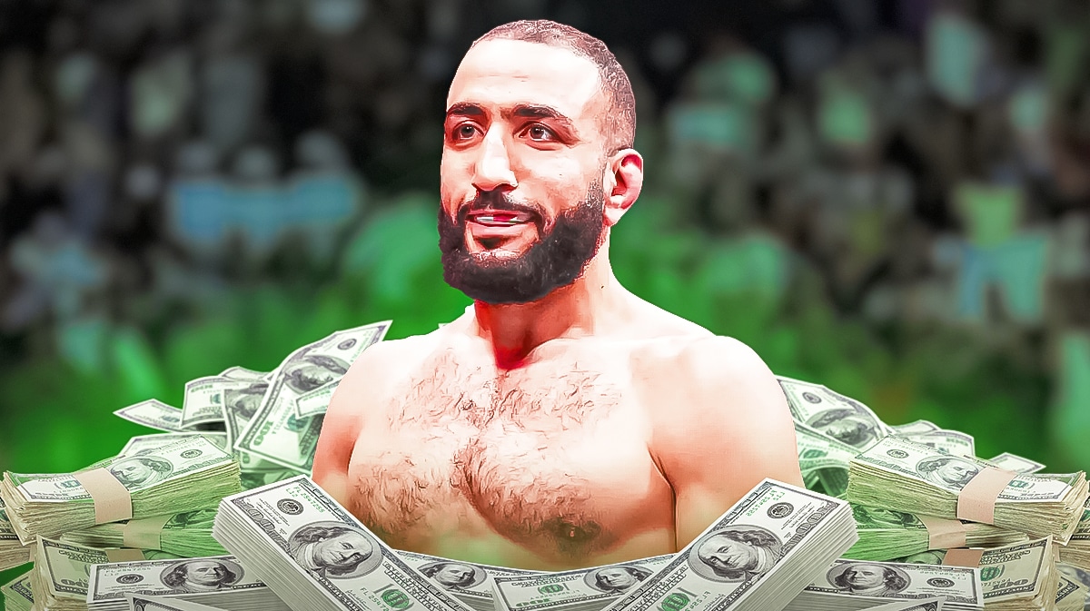 Belal Muhammad with money around him.