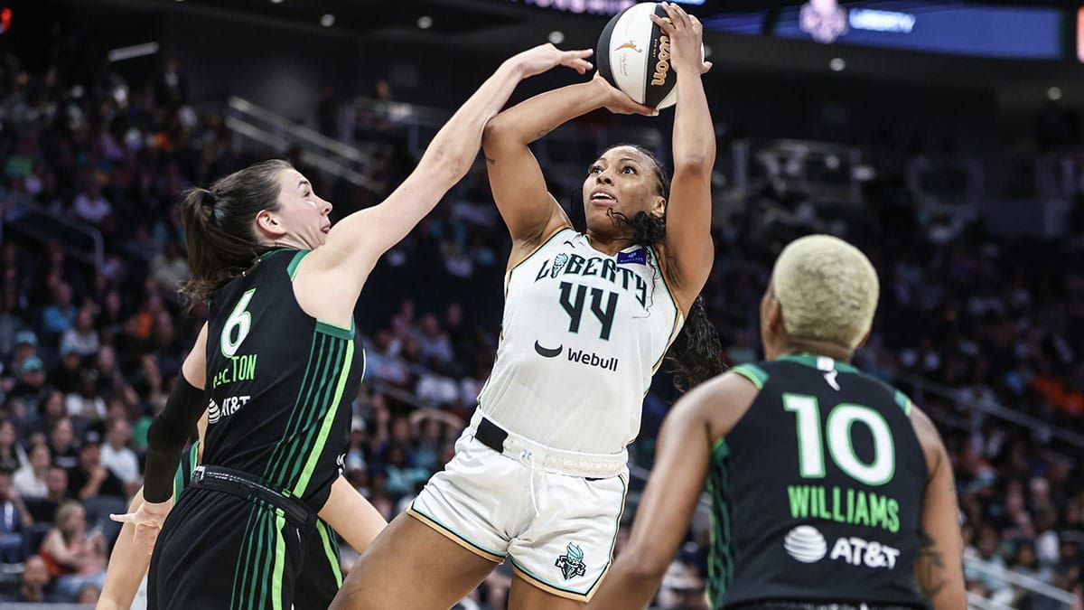New York Liberty forward Betnijah Laney-Hamilton (44) shoots over Minnesota Lynx forward Bridget Carleton (6) in the fourth quarter of the Commissioner’s Cup Championship game at UBS Arena. 