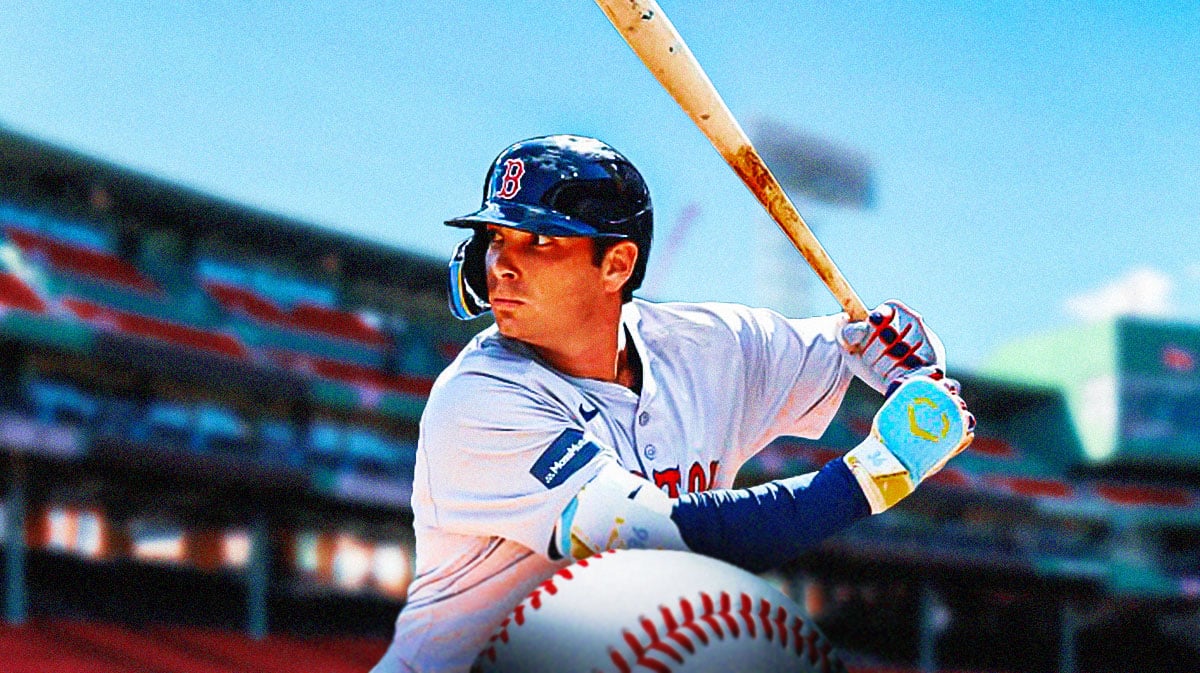Red Sox Triston Casas swinging a baseball bat at Fenway Park