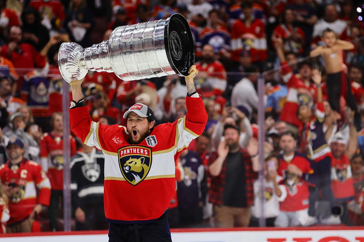 Florida Panthers defenseman Brandon Montour (62) lifts the cup after winning game seven of the 2024 Stanley Cup Final against the Edmonton Oilers at Amerant Bank Arena.