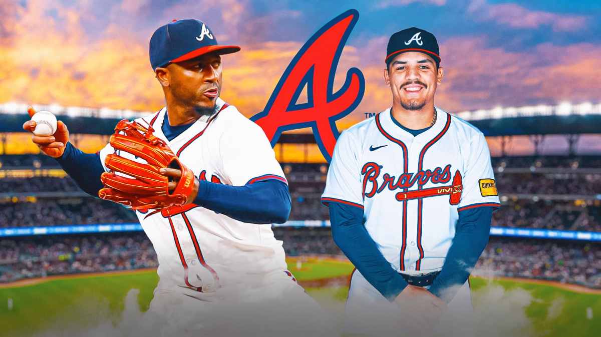 Ozzie Albies and Nacho Alvarez Jr. in front of a Braves logo