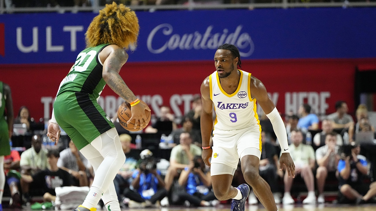 Los Angeles Lakers guard Bronny James (9) defends against Boston Celtics guard JD Davison (20) during the first half at Thomas & Mack Center. 