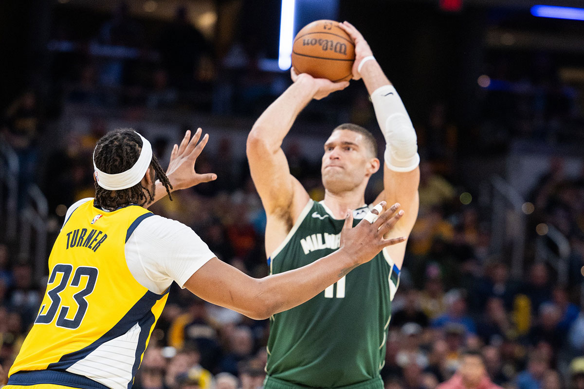 Milwaukee Bucks center Brook Lopez (11) shoots the ball while Indiana Pacers center Myles Turner (33) defends during game four of the first round for the 2024 NBA playoffs at Gainbridge Fieldhouse