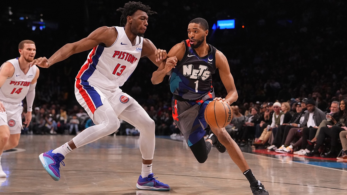 Apr 6, 2024; Brooklyn, New York, USA; Brooklyn Nets small forward Mikal Bridges (1) dribbles the ball against Detroit Pistons center James Wiseman (13) during the second half at Barclays Center. Mandatory Credit: Gregory Fisher-USA TODAY Sports