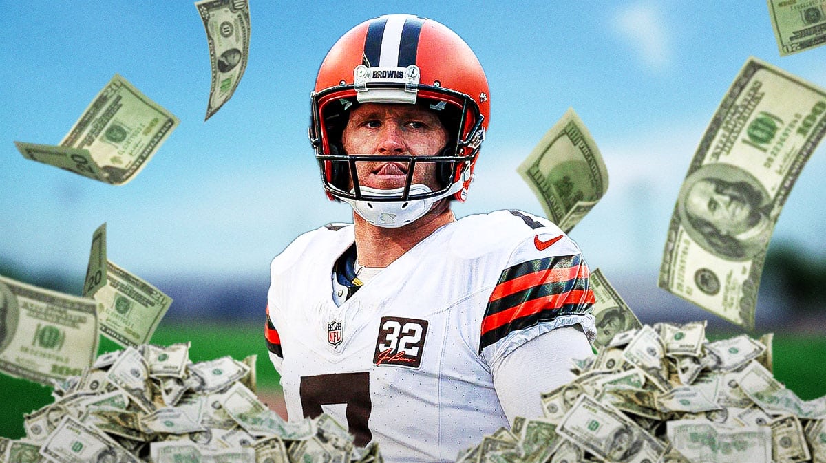 Dustin Hopkins with a bunch of money falling around him