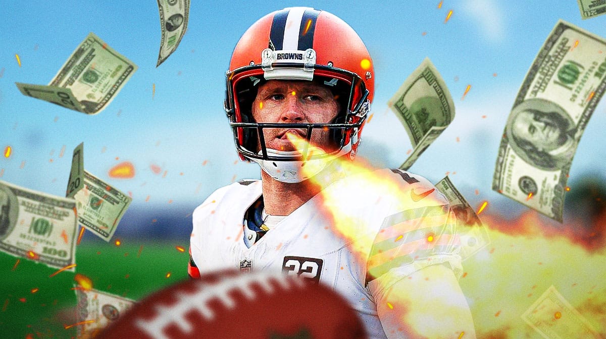 Dustin Hopkins breathing fire. Dollar bills flying around