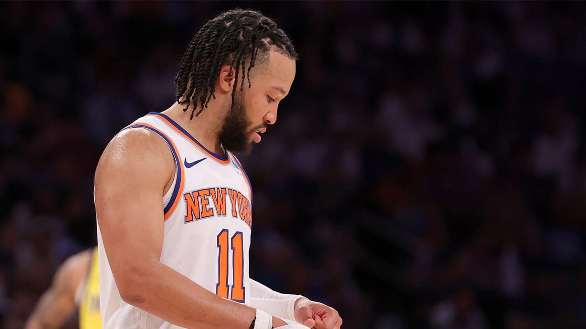 New York Knicks guard Jalen Brunson (11) flexes his left hand during the third quarter of game seven of the second round of the 2024 NBA playoffs against the Indiana Pacers at Madison Square Garden. 