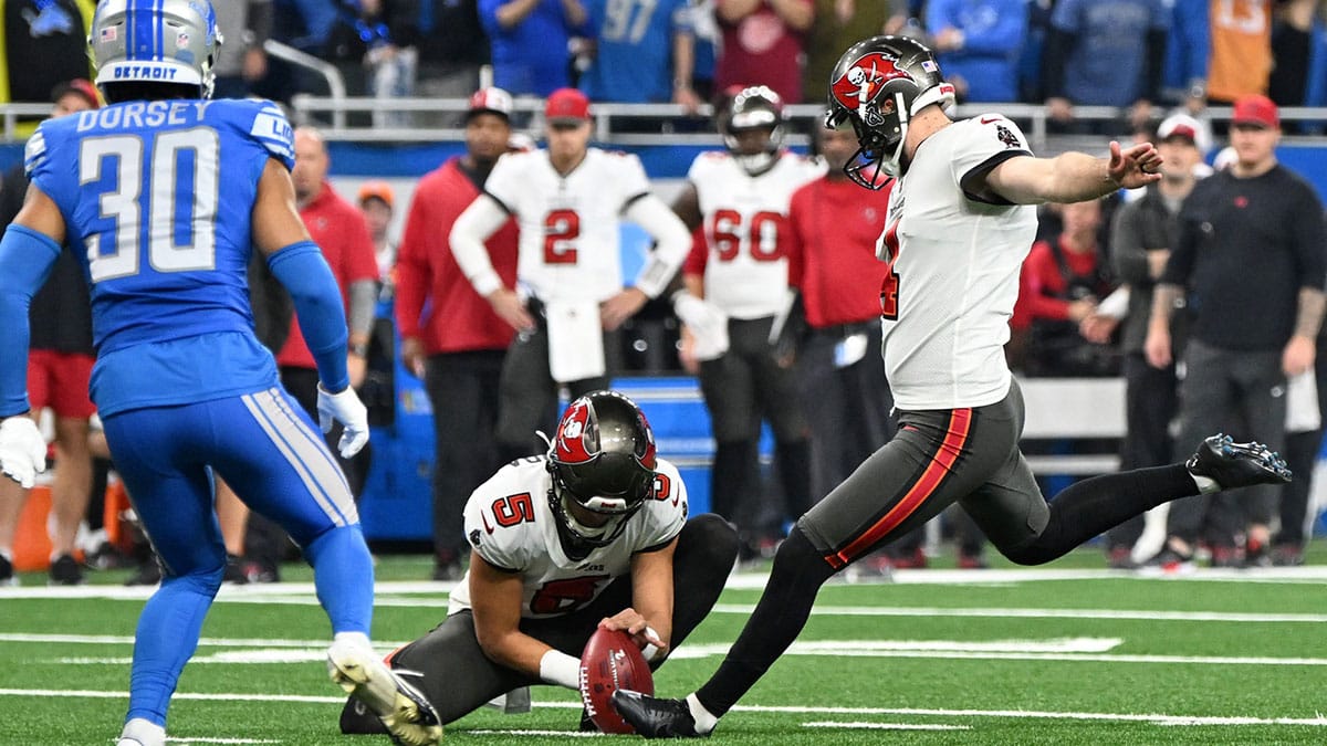 Tampa Bay Buccaneers place kicker Chase McLaughlin (4) kicks a field goal against the Detroit Lions during the first half in a 2024 NFC divisional round game at Ford Field. 