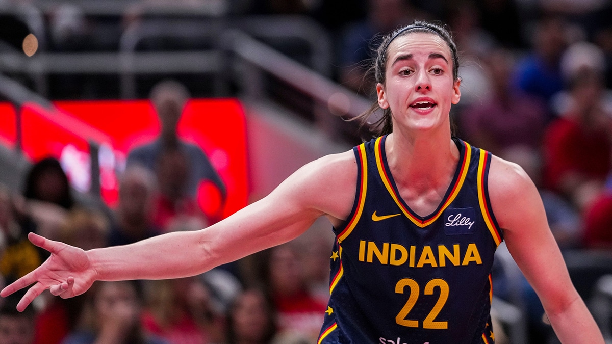 Indiana Fever guard Caitlin Clark (22) yells Wednesday, July 10, 2024, during the game at Gainbridge Fieldhouse in Indianapolis.