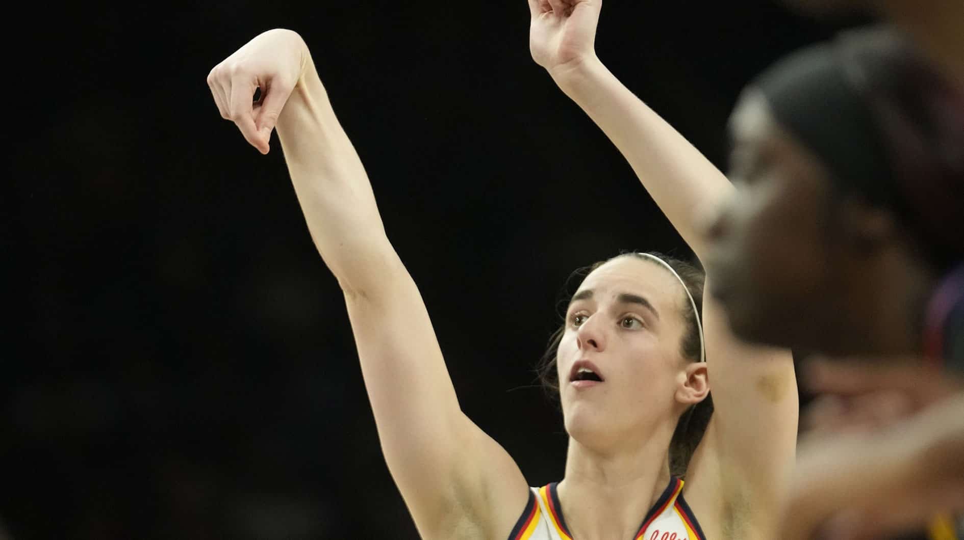  Indiana Fever guard Caitlin Clark (22) shoots a free throw against the Phoenix Mercury during the fourth quarter at Footprint Center. 