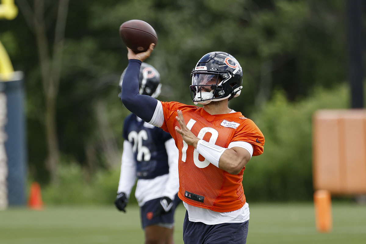 Chicago Bears quarterback Caleb Williams (18) passes the ball during the team's minicamp at Halas Hall.