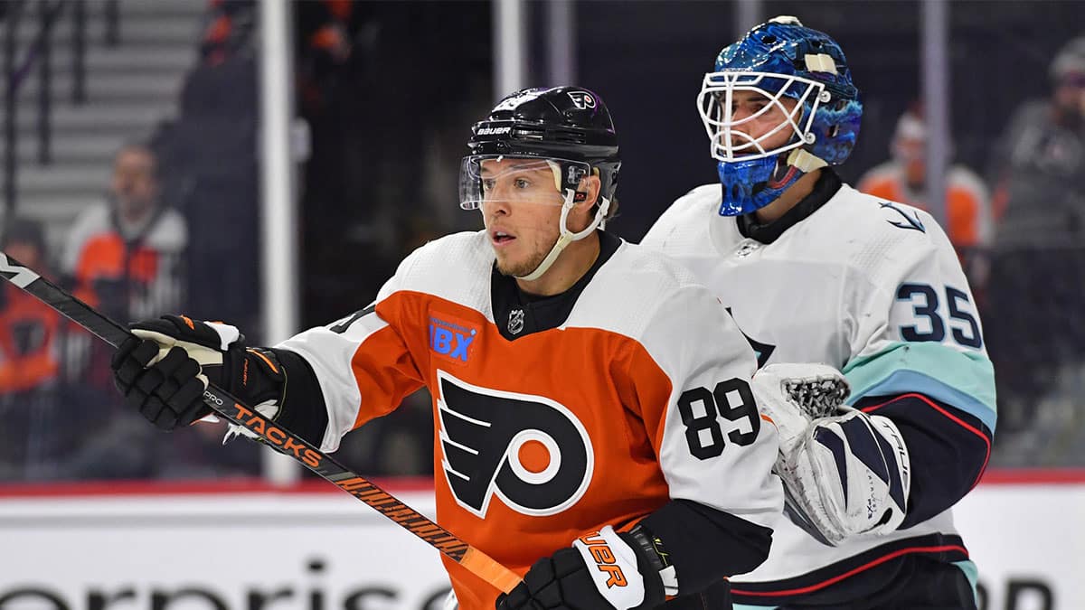 Philadelphia Flyers right wing Cam Atkinson (89) stands in for too Seattle Kraken goaltender Joey Daccord (35) during the first period at Wells Fargo Center. 
