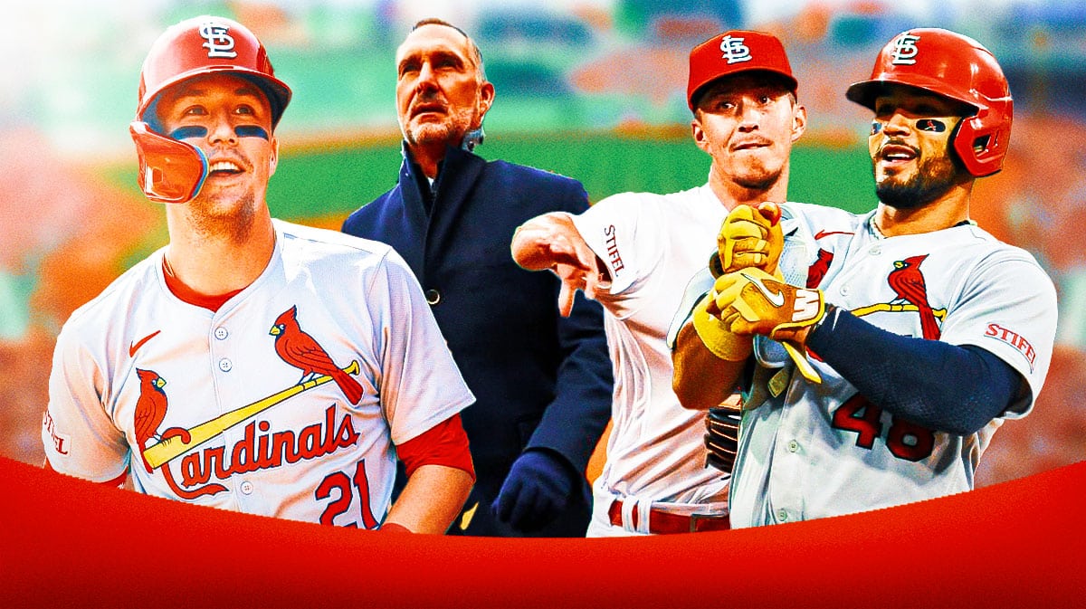 Photo: Lars Nootbar, Ivan Herrera, Tommy Edman all in Cardinals jerseys in action, John Mozeliak in background