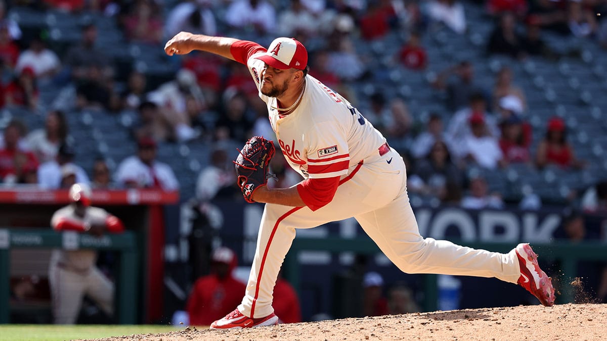 Jun 9, 2024; Anaheim, California, USA; Los Angeles Angels relief pitcher Carlos Estevez (53) pitches during the ninth inning against the Houston Astros at Angel Stadium. 