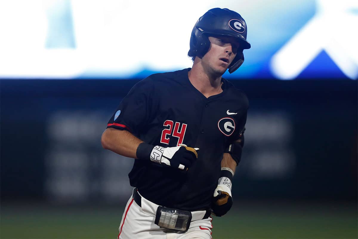 Georgia's Charlie Condon (24) rounds the bases after hitting a home run during Game 3 of the Super NCAA Regional against NC State at Foley Field on Monday, June 10, 2024 in Athens, Ga. NC State won 8-5.