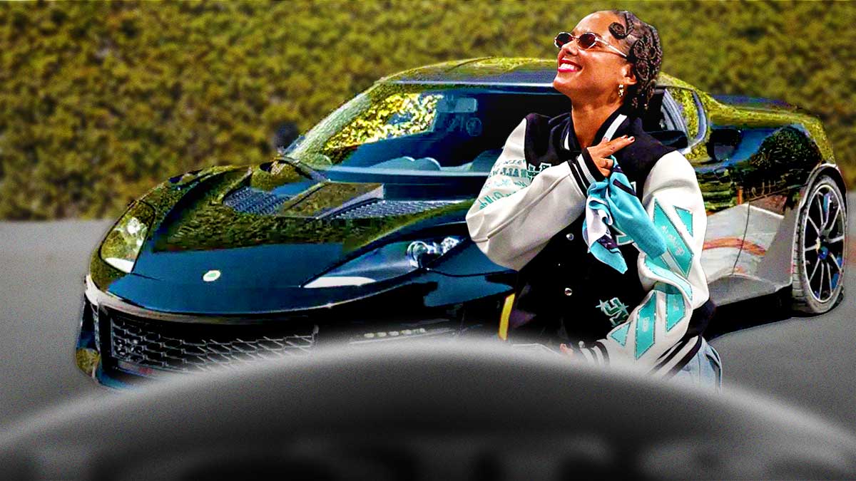 Alicia Keys in front of a car from her collection.