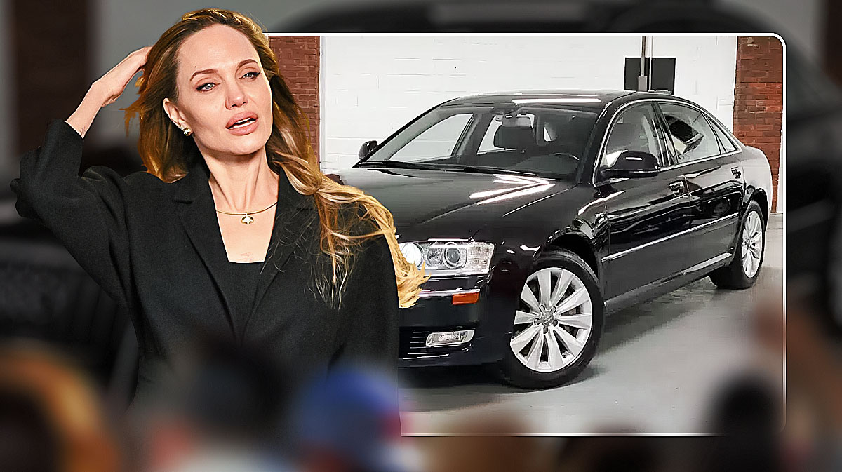 Angelina Jolie in front of a car from her collection.