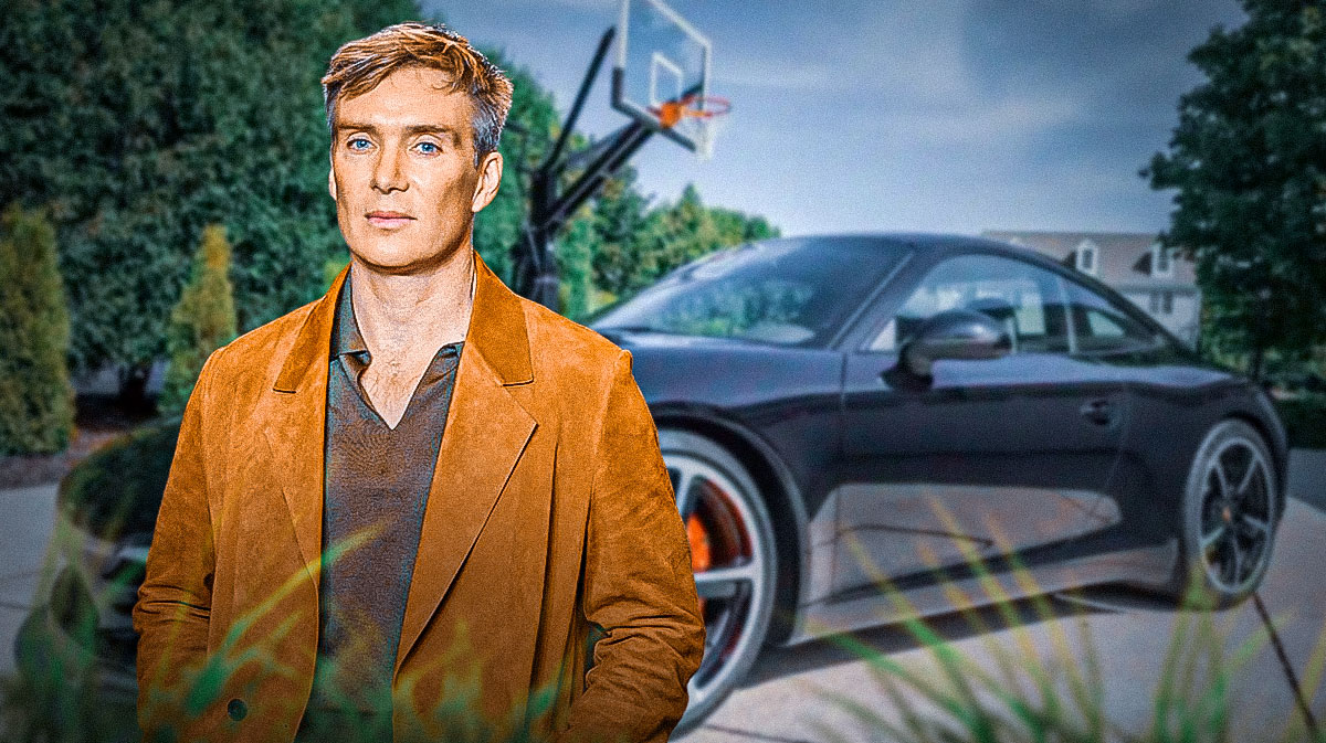 Cillian Murphy in front of a car from his collection.