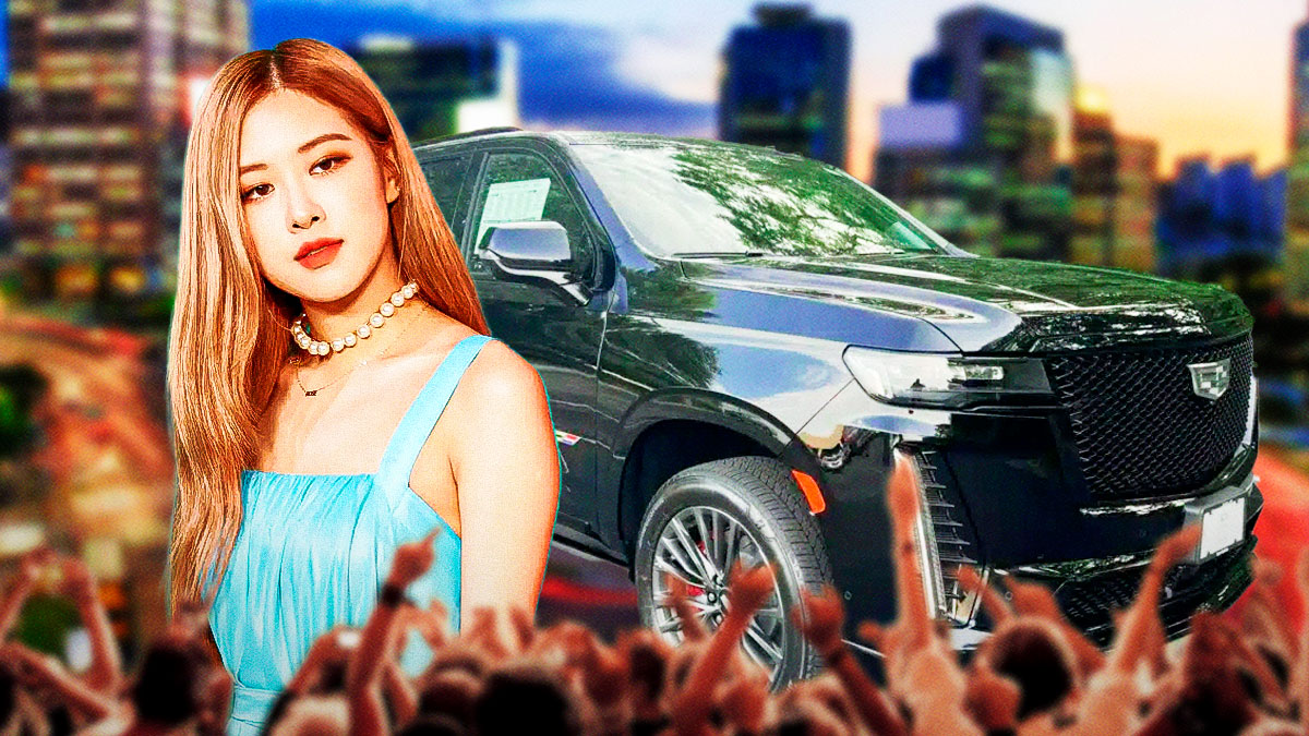 Rosé in front of a car from her collection.