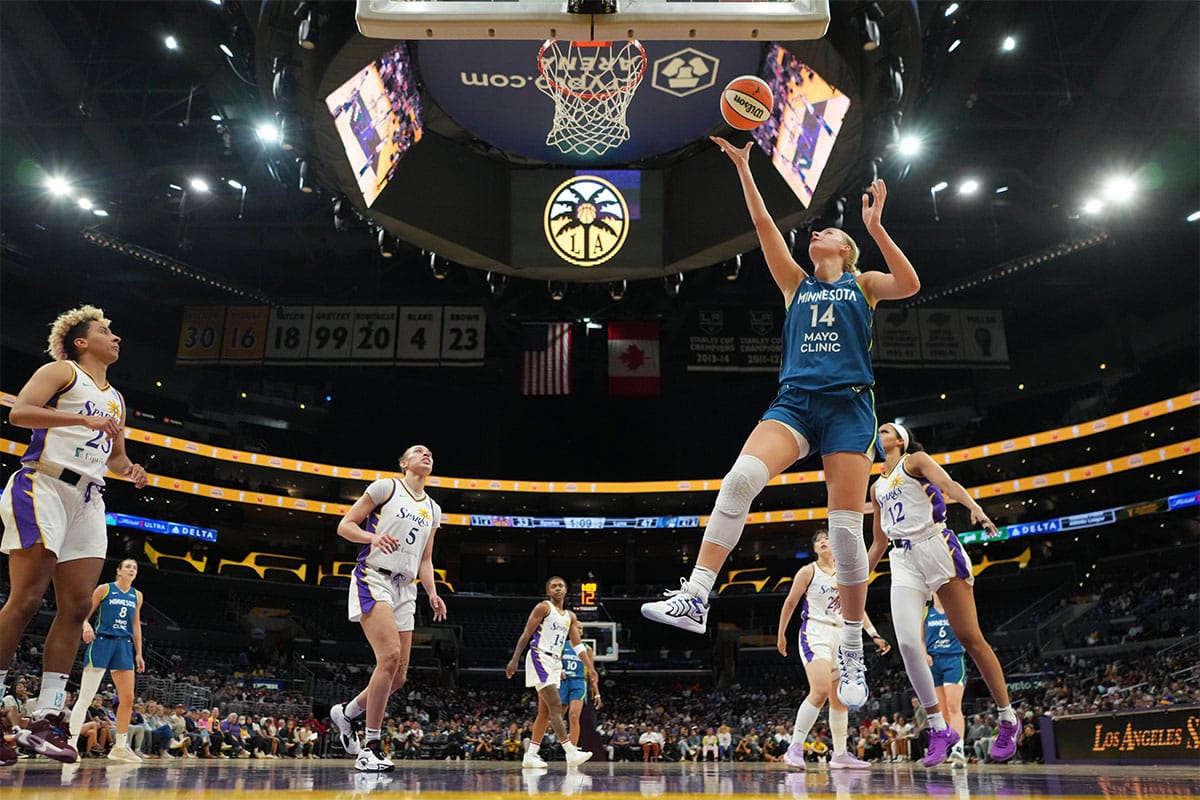 Minnesota Lynx forward Dorka Juhasz (14) shoots the ball against the LA Sparks in the first half.