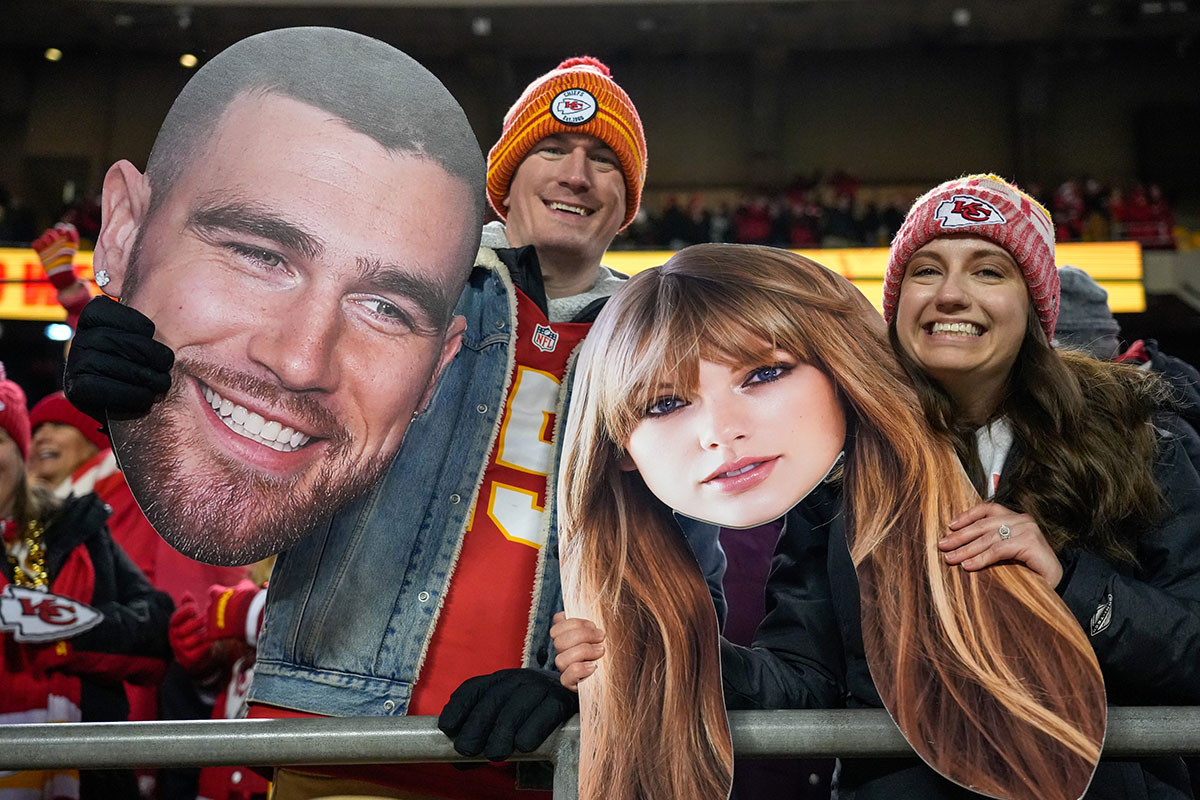 Chiefs fans with cut-outs of Travis Kelce, Taylor Swift during their game against the Cincinnati Bengals on December 31, 2023.