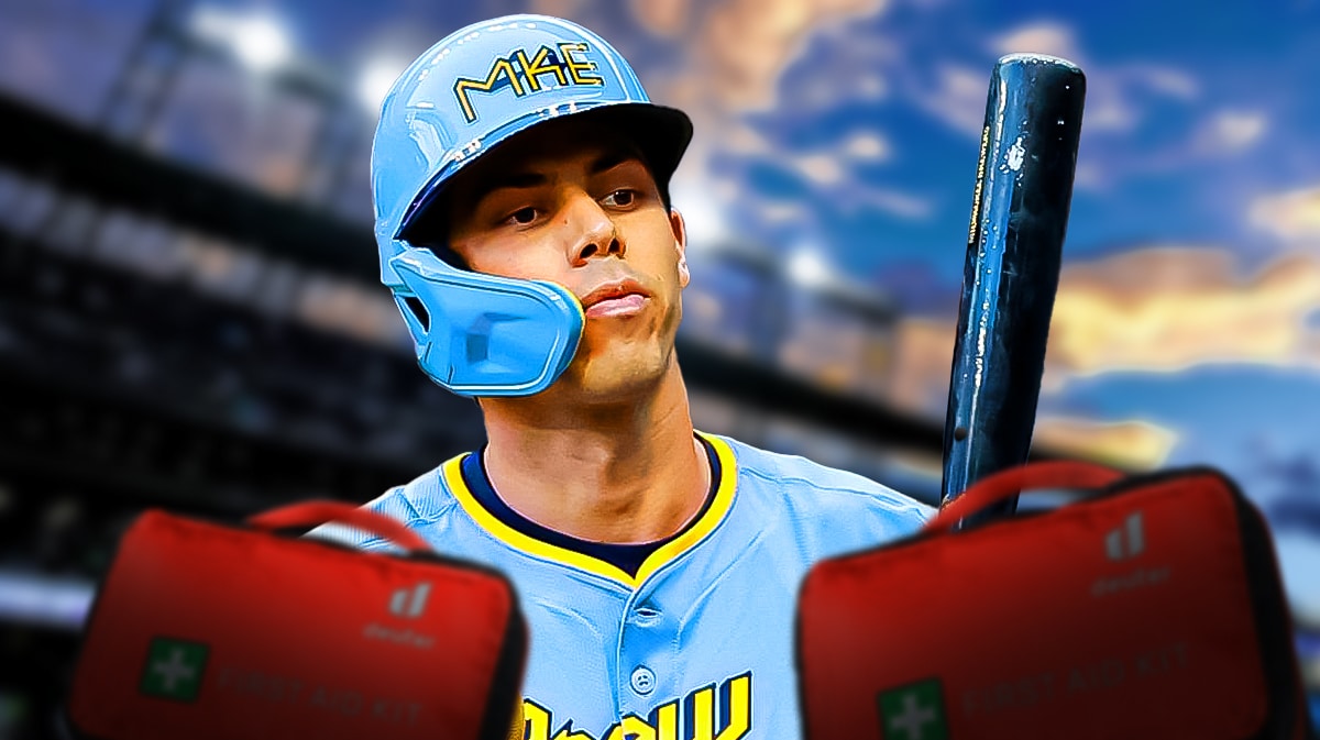 Christian Yelich in a Milwaukee Brewers uniform looking unhappy/disappointed with a red first aid kit in frame as Yelich's back injury will keep him on the injured list and out of the Brewers' lineup for awhile and the team must decide how to handle the MLB trade deadline.