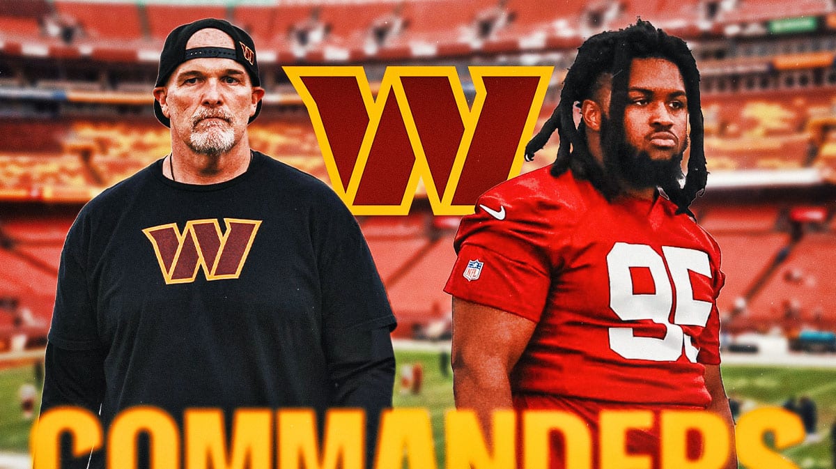 Commanders Dan Quinn next to Jer'Zhan Newton